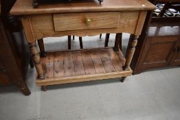 A traditional stained frame hall or kitchen table, width approx. 89cm