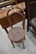 A traditional bentwood child's high chair