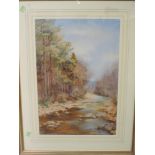 A watercolour, attributed to L M Warden, A Lancashire Beck, initialled, 51 x 35cm, plus frame and