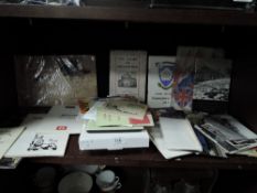 A selection of ephemera including Skelsmergh book and railway related postcards