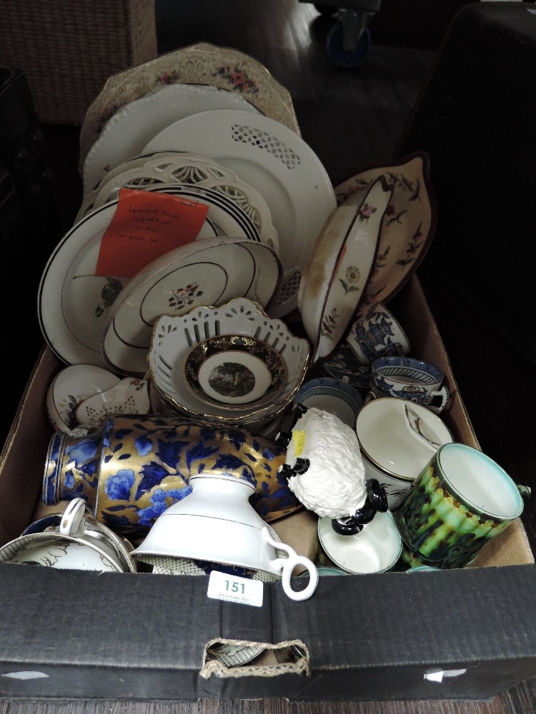 A box full of vintage and antique ceramics including early Davenport pottery.