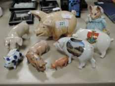 a selection of pig figurines including Beswick aunt Pettitoes.