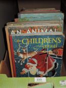 A box of vintage childrens annuals and story books.