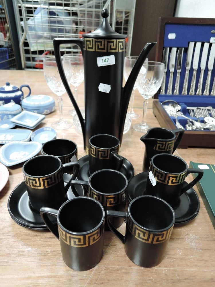 A Portmeirion coffee service having Greek key design, coffee pot, cups and saucers and sugar basin