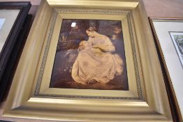 An antique crystoleum of a nursing mother and child in gilt frame