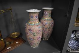 A pair of Chinese vase in a Cantonese palette with extensive enamel work