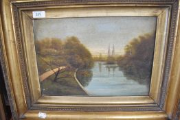 A naive oil on board of a river scene in gilt and gesso frame