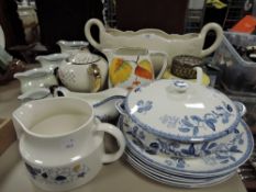 A collection of ceramics including blue and white ware, lustre jugs and Arthur wood vase or urn.