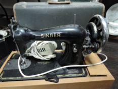 A vintage singer sewing machine.