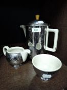 A mid century insulated coffee pot trio.