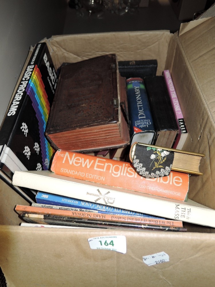 A box of books of religious and cookery interest predominantly.