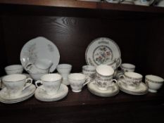 A mixed lot of cups and saucers including Wedgwood.