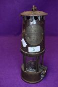 A genuine miners lamp having steel and brass casing by the Protector lamp co, type S.L no.26