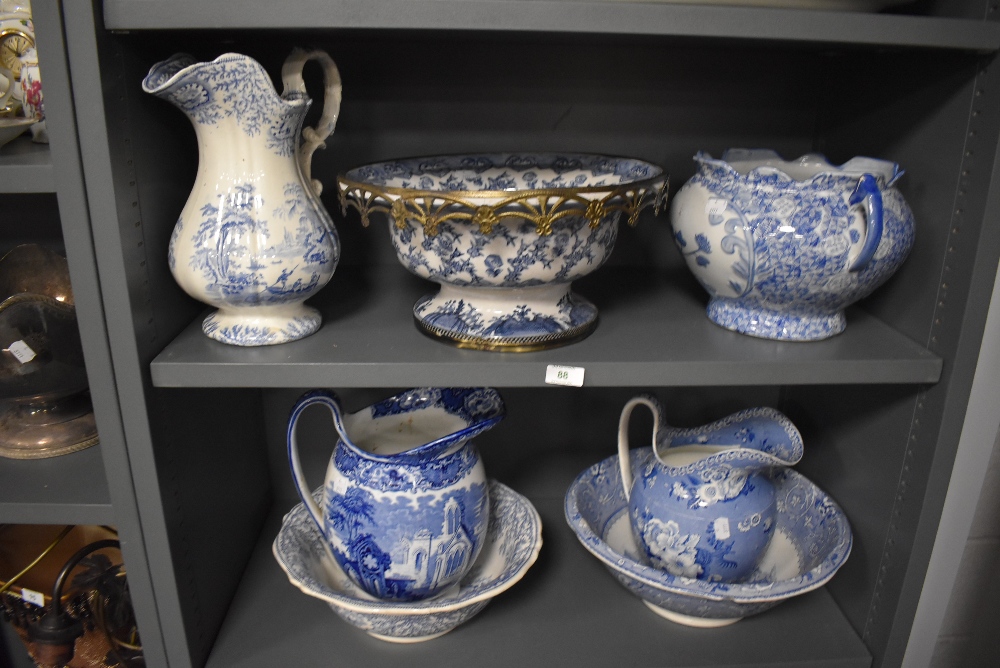 A fine selection of large blue and white wear items including hand painted porcelain footed rose