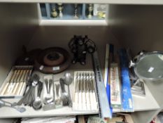 An assortment of flat ware, rulers, treen and more.