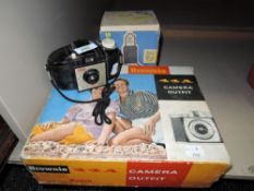A selection of camera equipment including Philips photolita bulb, Brownie flash holder 3 Kodak