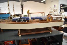 A wooden hand built radio controlled model Steam Cruiser Boat, with controller, length approx 115cm