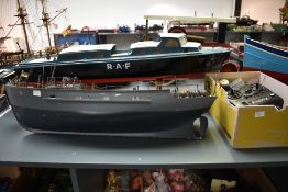 A wooden radio controlled scale model of a Vosper RAF Crash Tender length 90cm on wooden stand along