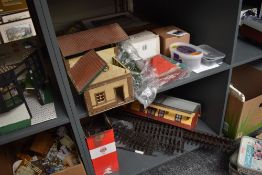 Four shelves of Gauge 1 and similar accessories including Piko Station with box, motors, parts,