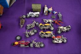 A collection of Matchbox and Britains diecast Motorbikes and lead Farm figures and accessories