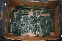 A box of Dinky and similar Military Vehicles and Field Guns including Tank Transporter, Tanks,