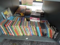 A shelf of mixed vintage Ladybird Books including 1964 The Seashore, 1968 Horses, 1971 Scouts,