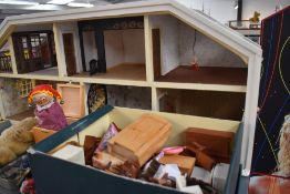 A 1970's Lunby two storey Dolls House with wooden furniture and accessories