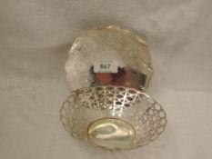 A silver trinket dish of circular form having extensive pierced oval decoration, Birmingham 1960,