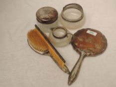 A three piece white metal dressing table set stamped 800, possibly of Dutch origin, a cut glass