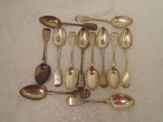 A set of twelve Victorian silver tea spoons in the fiddle back pattern bearing monogram to