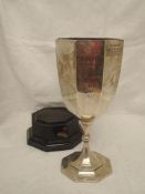 An Edwardian silver oversized trophy cup of octagonal goblet form bearing presentation