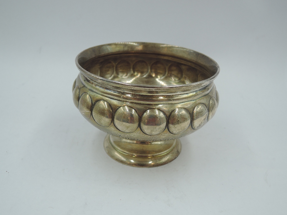 A small silver footed bowl having moulded dot decoration and presentation inscription: Central