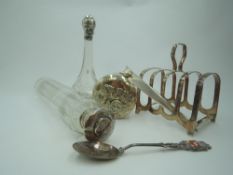 A selection of HM silver and white metal including three glass dressing table pots with silver/white