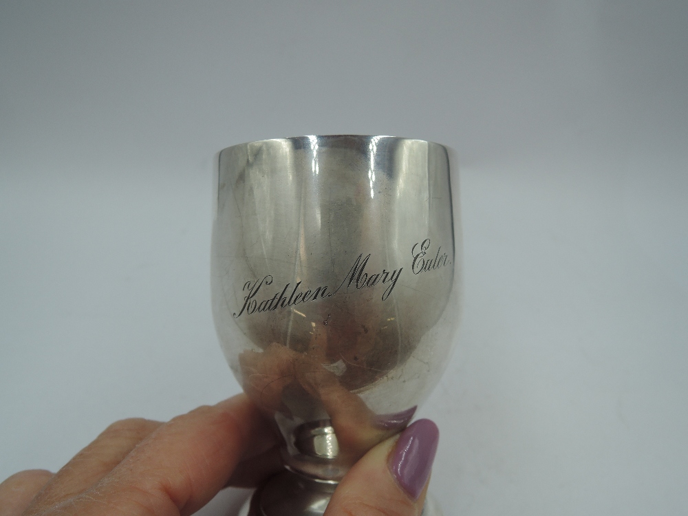 A silver Christening mug of plain stylised form bearing name to front & having angular handle, - Image 2 of 2