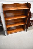 An early to mid 20th Century stained frame low bookshelf, width approx. 59cm