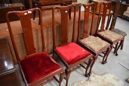 A set of four early 20th Century stained frame dining chairs in the Queen Anne style
