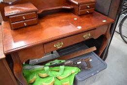 A vintage stained frame dressing table in the Queen Anne style with brass frieze drawer handles