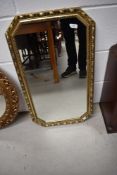 A vintage gilt frame wall mirror, portrait hangings, approx. 68 x 42cm