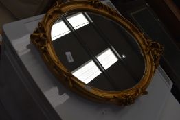 A reproduction gilt frame wall mirror, approx. 68 x 48cm