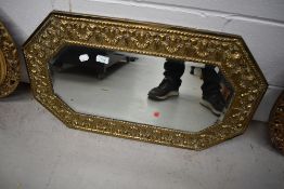 A vintage brass frame wall mirror, canted corners, width approx. 80cm