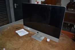 An Apple Mac with monitor, keyboard and mouse, internal hard drive has been wiped by IT