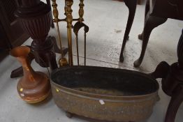 A brass companion stand, planter and copper jug