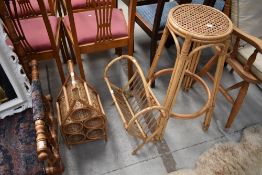 A selection of wicker items comprising wine rack, magazine rack and stool