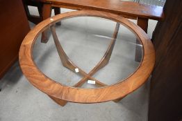 A vintage G plan circular top coffee table having glass top, diameter approx. 84cm