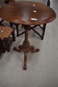 A 19th Century mahogany pedestal table having (possibly later) circular top, turned column and