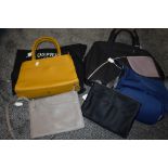 A selection of Handbags including Osprey and Radley.