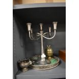A selection of table top items including Indian silver bowl, gallery tray and candle stick