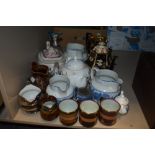 A collection of vintage ceramics including imari palette teapot and trivet, cups and saucers and mor