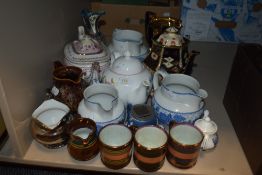 A collection of vintage ceramics including imari palette teapot and trivet, cups and saucers and mor