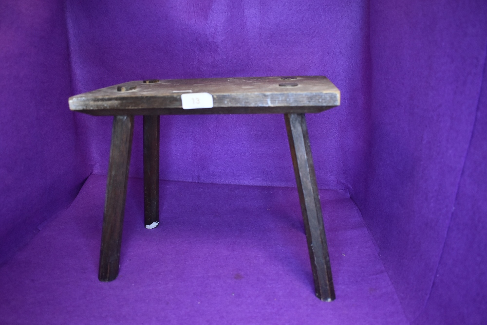 A folk art style foot or similar stool